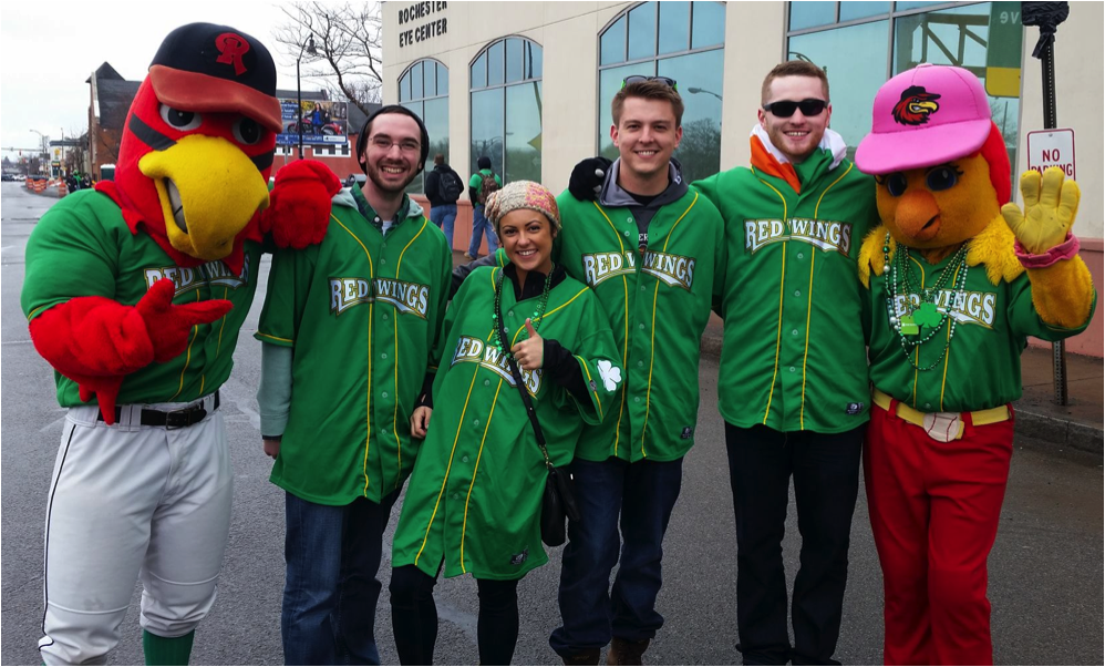 Julie is pictured center volunteering with the Rochester Red Wings staff and boyfriend Derek during the 2015 St. Patrick’s Day Parade 2015. (Downtown Rochester, NY)